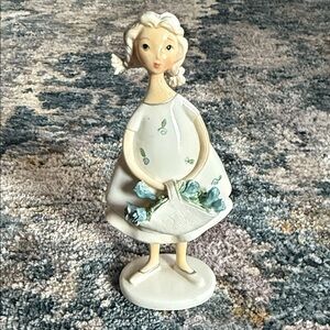 Charming Figurine with Basket